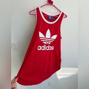 Ladies adidas racer back track tank
Medium
